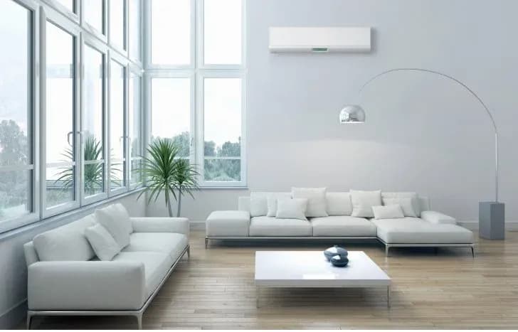 A large split type aircon installed in a bright living room