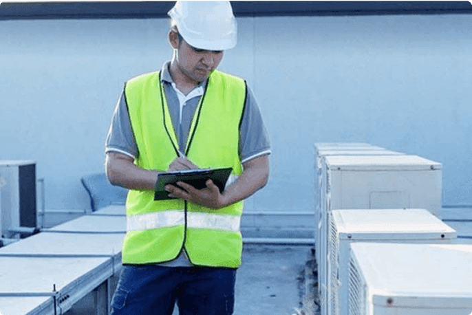 An engineering consultant helping a client choose the right equipment for their building’s HVAC requirements.