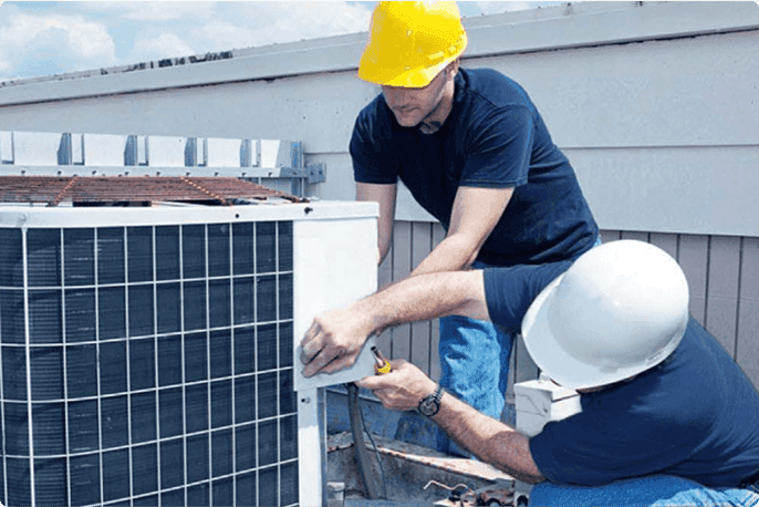 Engineers installing the HVAC system