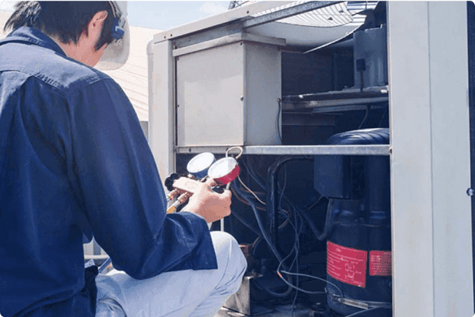 A specialist checking the HVAC system