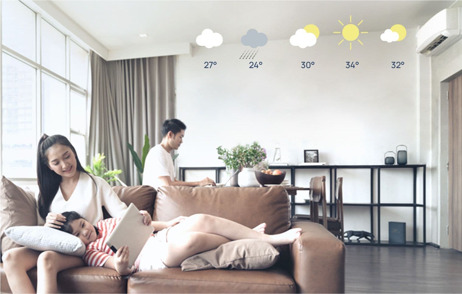 A family enjoying continuous and energy saving cooling no matter the temperature with Carrier aircon inverter