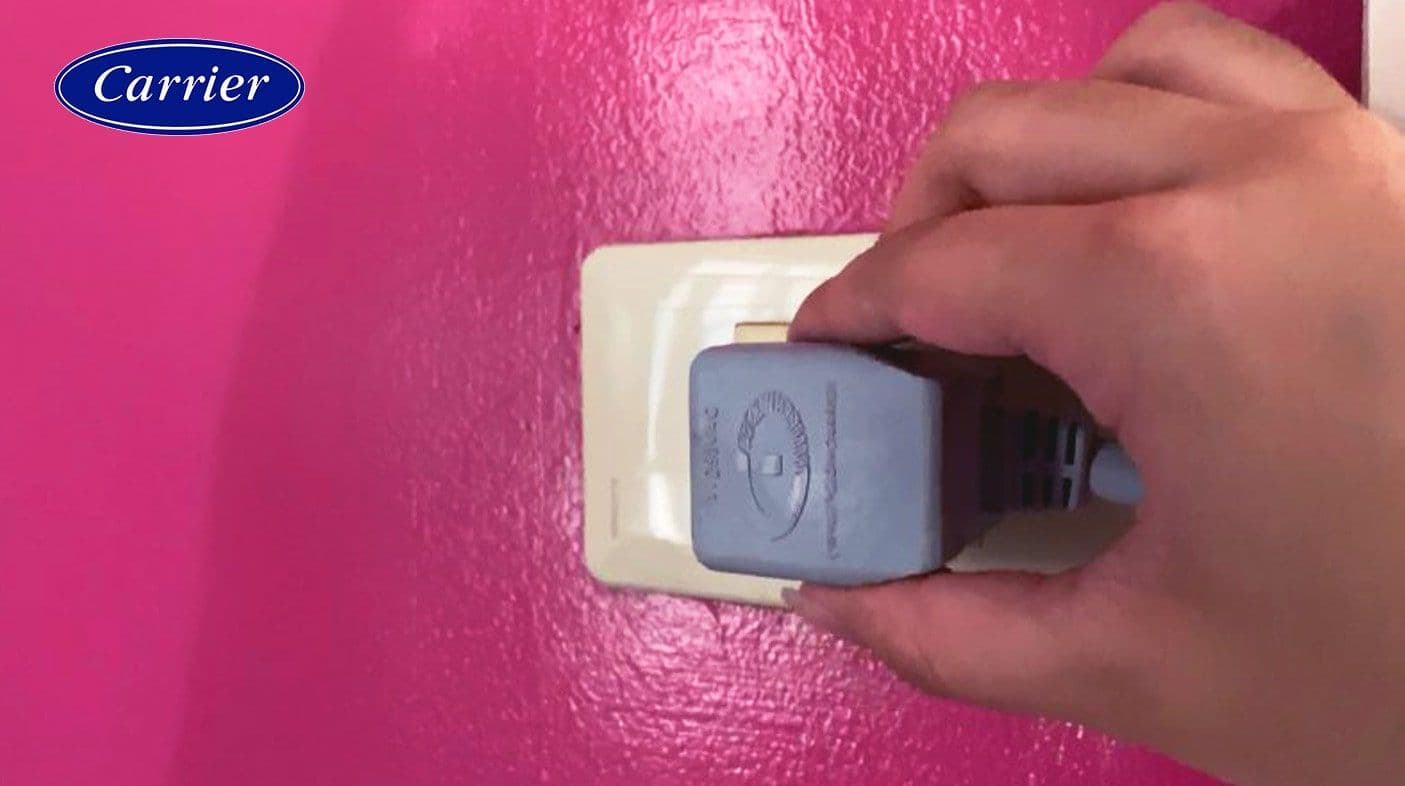 Removing the plug from the power outlet