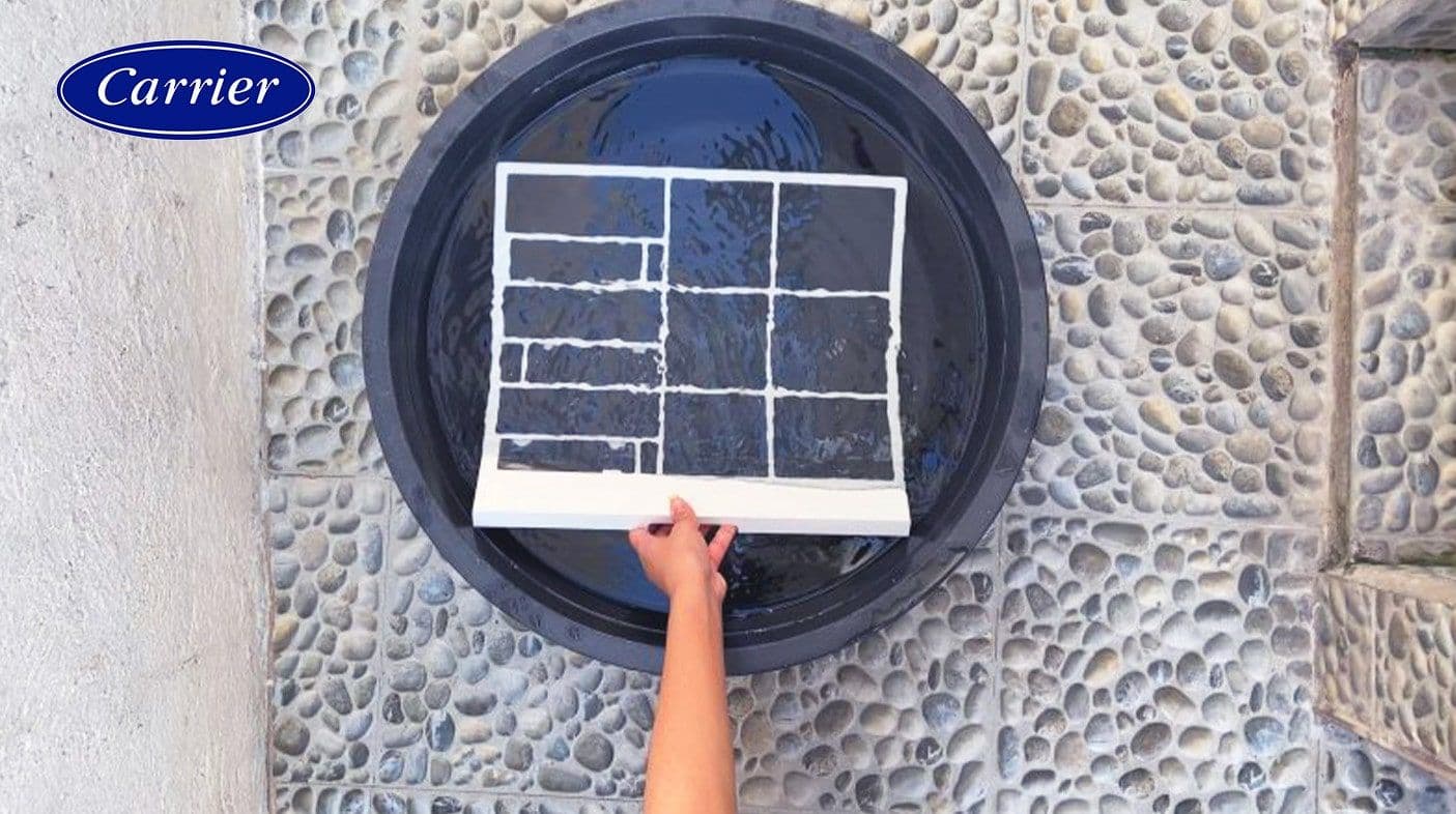 Fully soaking the main filter in the basin of water
