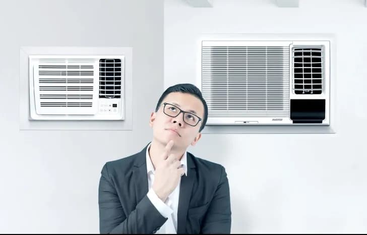 A homeowner deciding between a smaller and larger window type aircon that could cool his room more quickly